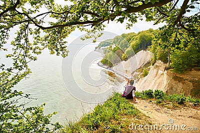 Tourists looking out to sea in Jasmund National Park Stock Photo