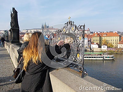 Tourists make their wishes in Prague Editorial Stock Photo