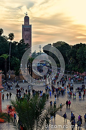 Tourists in Marrakesh at sunset Editorial Stock Photo