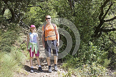 Tourists on the mountain trek Stock Photo