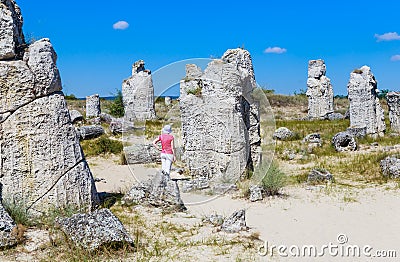Tourists in the natural phenomenon Pobiti Kamani, Bulgaria Editorial Stock Photo
