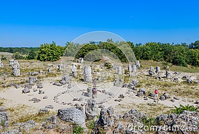 Tourists in the natural phenomenon Pobiti Kamani Editorial Stock Photo