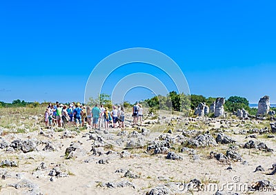Tourists in the natural phenomenon Pobiti Kamani Editorial Stock Photo