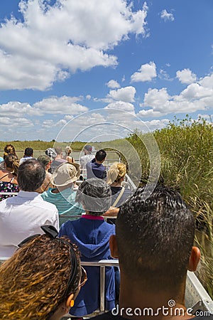 Tourists onboard airboat in the Everglades Safari Park, Miami, Florida Editorial Stock Photo