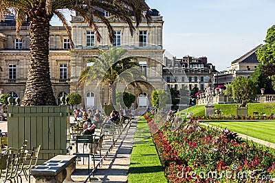 Tourists and Parisians relaxing in the Luxembourg Gardens. Paris Editorial Stock Photo