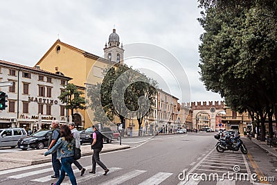 Tourists pass Corso Porta Nuova in Verona Editorial Stock Photo