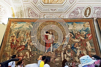 Tourists pass through one of the galleries of the Vatican Museum Editorial Stock Photo