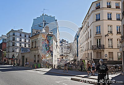 Tourists on the Quai de Valmy in the 10th arrondissement in Paris Editorial Stock Photo