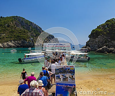 Tourists queue for boats in Palaiokastritsa, Corfu Editorial Stock Photo