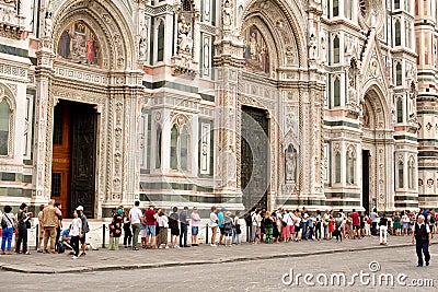 Tourists queued in a line waiting for entry into the Il Duomo church Editorial Stock Photo