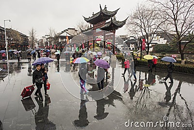 Tourists in the rainy days of Confucius Temple Scenic Spot Editorial Stock Photo