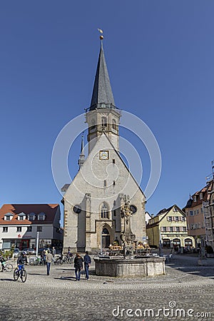 tourists relax at the town central square of Weikersheim along the romantic road Editorial Stock Photo