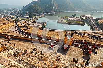 Tourists riding elephants on ascend to Amer fort Editorial Stock Photo