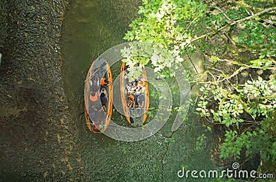 Tourists sail on a rubber boat along the canyon, Georgia, top view Editorial Stock Photo
