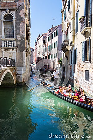 Tourists are sailing on gondola Venice Editorial Stock Photo