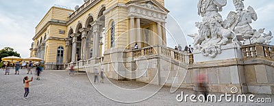 Tourists at Schoenbrunn Castle near Gloriette building, Vienna - Austria. Blurred people movement Editorial Stock Photo