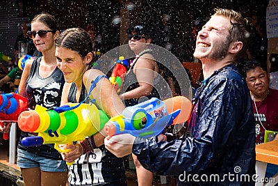 Tourists Shooting Water Guns at Songkran Festival in Bangkok, Th Editorial Stock Photo