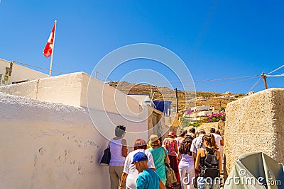 Tourists sightseeing at old abondened streets Santorini Greece Editorial Stock Photo