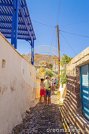 Tourists sightseeing at old abondened streets Santorini Greece Editorial Stock Photo