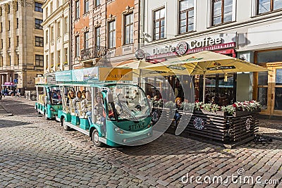 Tourists on sightseeing tour Riga Editorial Stock Photo