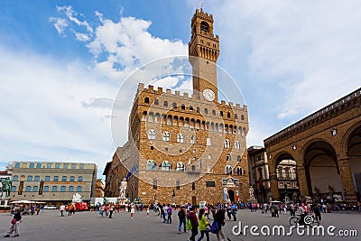 Tourists on Signoria Square near Palazzo Vecchio Editorial Stock Photo