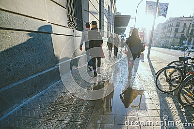 Tourists spend their time in the streets of Barcelona Editorial Stock Photo