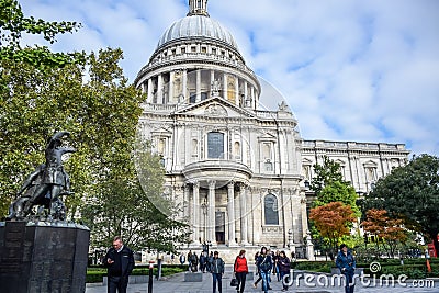 Tourists spending their time at St Paul`s Cathedral facade in London, England, United Kingdom Editorial Stock Photo