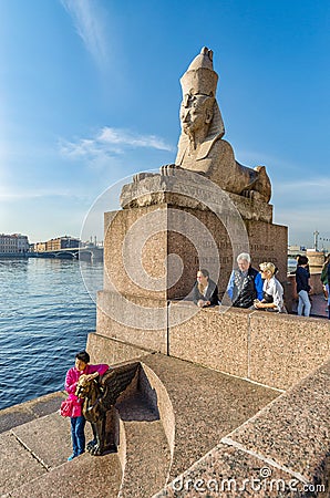 The tourists by The Sphinx and The Gryphon monument . Editorial Stock Photo