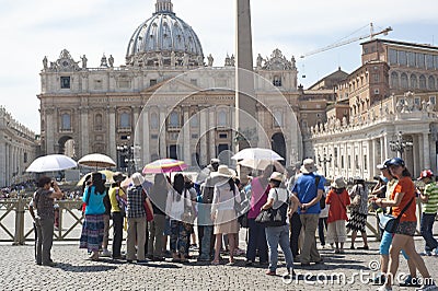 Tourists standing in a line at St Peters Church Editorial Stock Photo