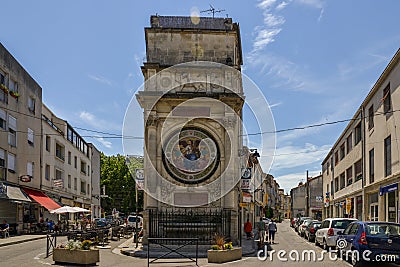 Tourists on street of the historical centre of Arles, an ancient Roman city and commune on the south of France in Editorial Stock Photo