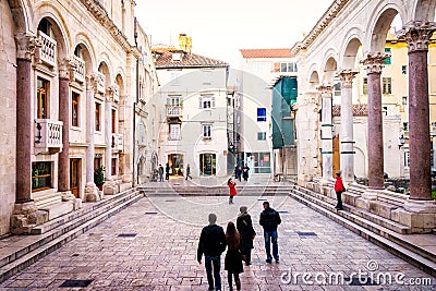 Tourists take a tour of the remains of palace of the Roman emperor Diocletian in Split, Croatia Editorial Stock Photo
