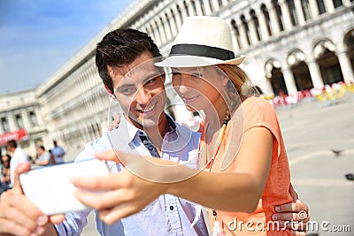 Tourists taking picture in Venice Stock Photo
