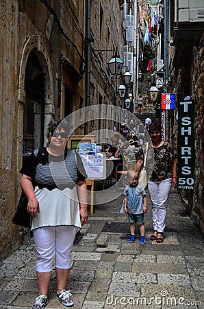 Tourists in Tipical little street in old town of Dubrovnik ,Croatia Editorial Stock Photo