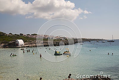 Tourists in Torret beach Editorial Stock Photo