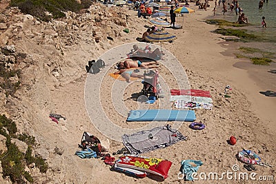 Tourists in Torret beach Editorial Stock Photo