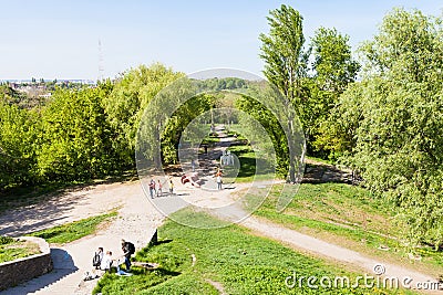 Tourists in urban park near Landscape alley Editorial Stock Photo