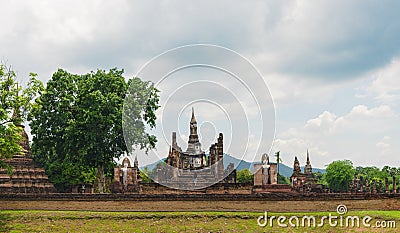 Tourists are using smartphones to take pictures.Sukhothai Historical Park It is an important temple of Sukhothai. Inside there is Stock Photo