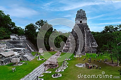 Tourists visit the Great Plaza del Tikal. View of the Temple of the Great Jaguar Stock Photo