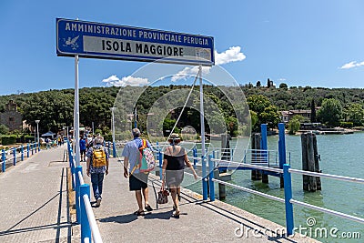 Tourists visit the Isola Maggiore of Lake Trasimeno Editorial Stock Photo