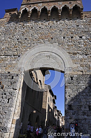 Tourists visit the Medieval San Gimignano hilltop town. Tuscany region. Italy Editorial Stock Photo