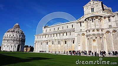 Tourists visit Piazza dei Miracoli, one of the most famous monument place in Italy Editorial Stock Photo