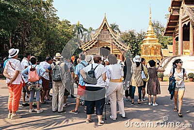Tourists visit Wat Phra Singh Editorial Stock Photo
