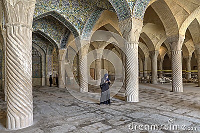 Tourists visited prayer hall of Vakil mosque in Shiraz, Iran. Editorial Stock Photo