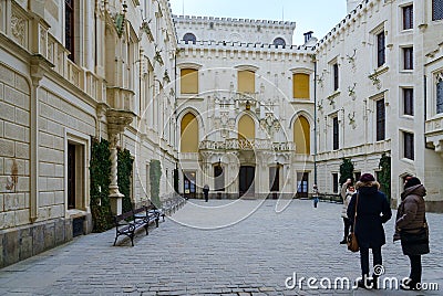 Tourists are visiting castle Hluboka nad Vltavou, South Bohemia Editorial Stock Photo