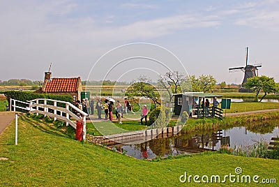 Tourists visiting the famous windmill at Kinderdijk, the Netherlands Editorial Stock Photo