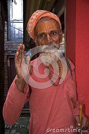 Peaceful Hindu Holy Man portrait in Nepal offers blessing Editorial Stock Photo