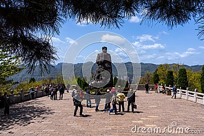 Tourists visiting statue of Marshall He Long. 10 Marshalls of the Peop Editorial Stock Photo