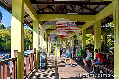 Tourists wait for the start of the tour at the boat station. Adventure on the island of Langkawi Editorial Stock Photo