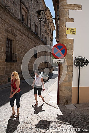 Tourists walk along the monumental area of Ubeda Editorial Stock Photo