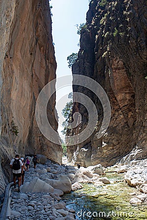 tourists walk along the mountain gorge travelling and vacation Editorial Stock Photo
